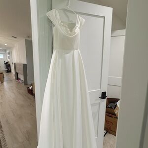 Elegant White Gown with Beaded Bodice